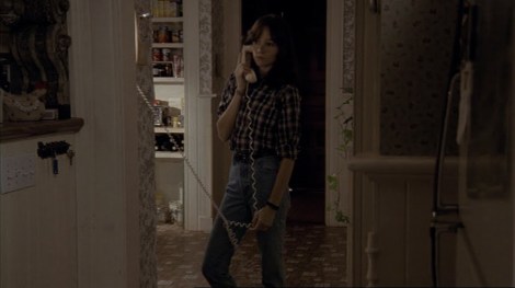 the house of the devil jocelin donahue phone flannel