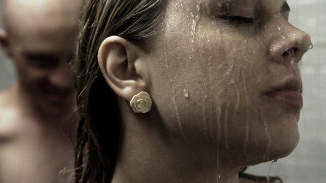 dark feed movie bald guy shower