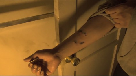 paranormal activity the marked ones arm bite